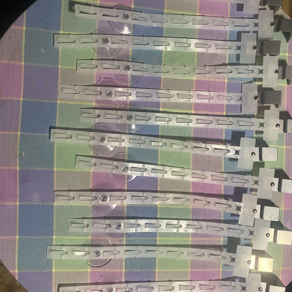 Lot Of 12 Merchandise Display Clip Strips. 8 Slot. One Sided. Used.
